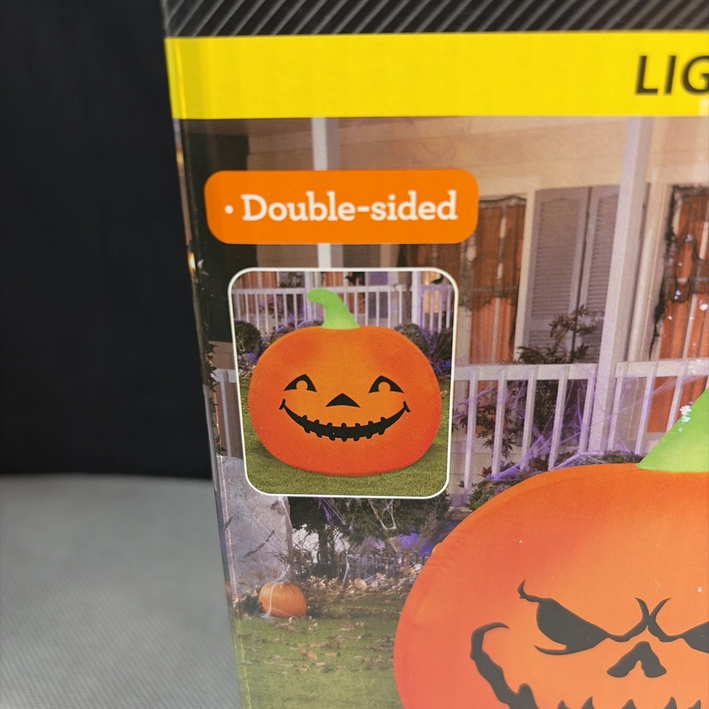 celebrate! Lighted Airblown Inflatable Reversible Jack-o-Lantern - 3 Ft. Tall - Picture 2 of 4